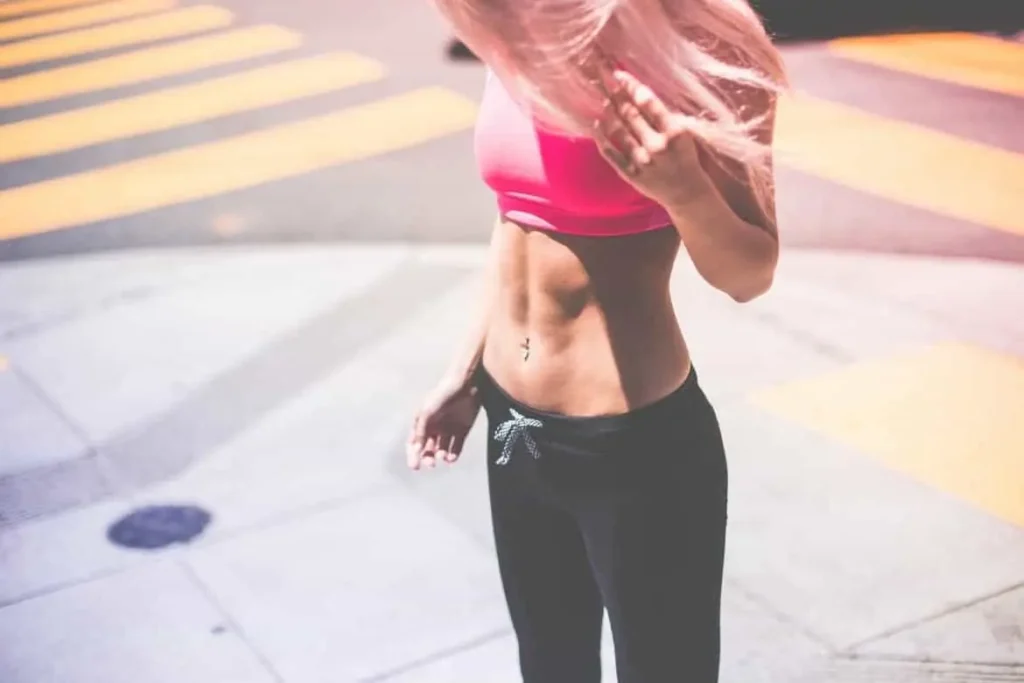 Woman with toned stomach after LA-EMS Body Sculpting Treatment Bury St Edmunds 